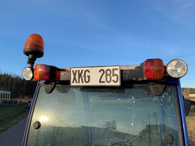 630553-7 Iseki TXG 23 with folding plow and salt / sand spreader