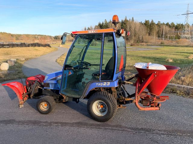 630553-8 Iseki TXG 23 with folding plow and salt / sand spreader