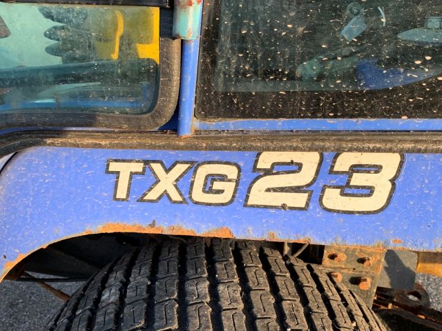 630553-9 Iseki TXG 23 with folding plow and salt / sand spreader