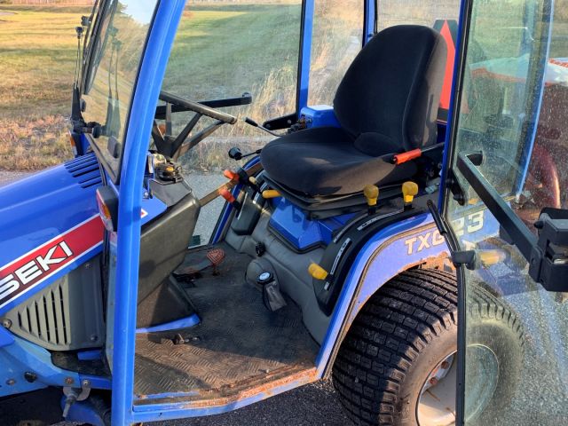 630553-12 Iseki TXG 23 with folding plow and salt / sand spreader