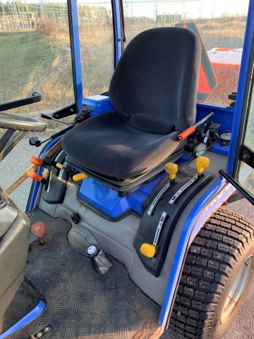 630553-17 Iseki TXG 23 with folding plow and salt / sand spreader