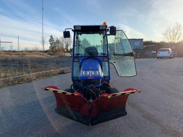 630553-22 Iseki TXG 23 with folding plow and salt / sand spreader