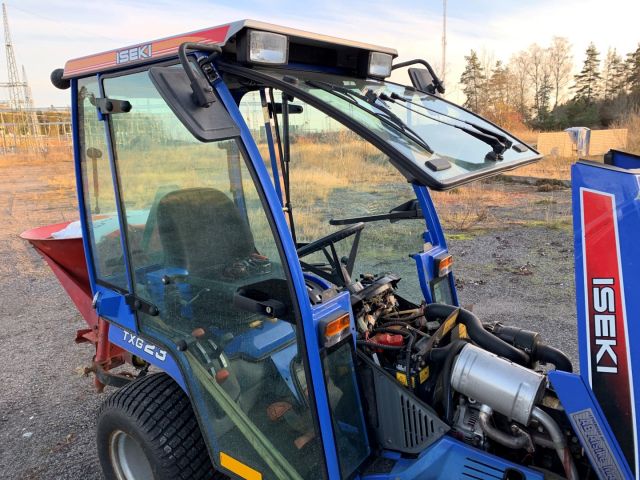 630553-29 Iseki TXG 23 with folding plow and salt / sand spreader