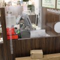 630152-4 Checkout counter with several parts in wood laminate
