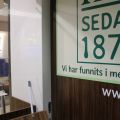 630152-6 Checkout counter with several parts in wood laminate