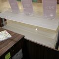 630152-9 Checkout counter with several parts in wood laminate