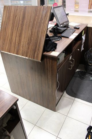 630152-11 Checkout counter with several parts in wood laminate