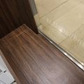 630152-13 Checkout counter with several parts in wood laminate