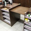 630152-14 Checkout counter with several parts in wood laminate