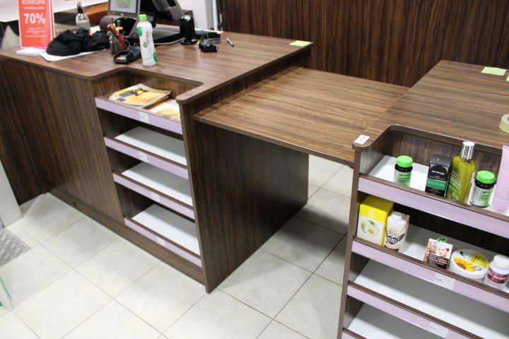 630152-14 Checkout counter with several parts in wood laminate