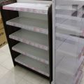 630154-3 Free-standing store shelves - about 32 sections, etc.