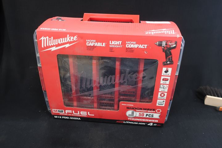 668051-1 Drill screwdriver with accessories Milwaukee M12 FDD-402 XA - Free shipping