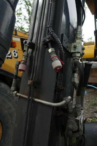 680391-15 Wheeled excavator Volvo EW 140 B