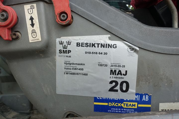 680391-38 Wheeled excavator Volvo EW 140 B