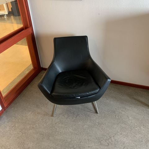 676216-1 Leather armchair Swedese Happy Swing by Roger Persson