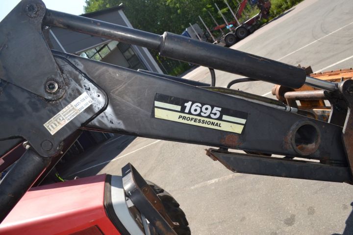 697230-11 Massey Ferguson 6140 with loader.