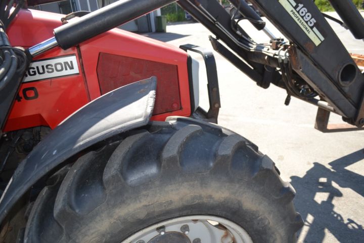 697230-17 Massey Ferguson 6140 with loader.