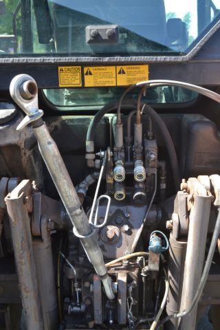 697230-19 Massey Ferguson 6140 with loader.