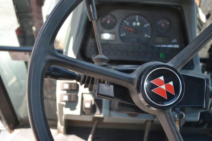 697230-23 Massey Ferguson 6140 with loader.