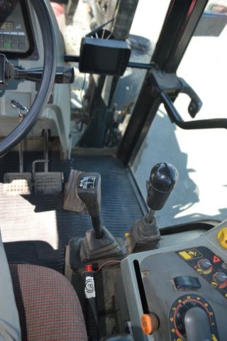 697230-25 Massey Ferguson 6140 with loader.