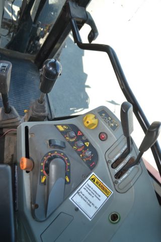 697230-26 Massey Ferguson 6140 with loader.