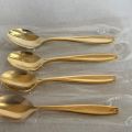 632933-1 Four coffee spoons 23 carat gold plated