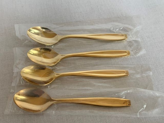 632933-1 Four coffee spoons 23 carat gold plated