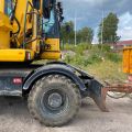 661315-11 Komatsu PW148-8 Wheeled excavator with trailer