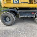 661315-14 Komatsu PW148-8 Wheeled excavator with trailer