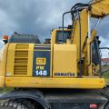 661315-5 Komatsu PW148-8 Wheeled excavator with trailer