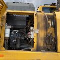 661315-18 Komatsu PW148-8 Wheeled excavator with trailer