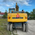 661315-7 Komatsu PW148-8 Wheeled excavator with trailer