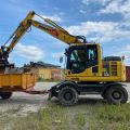 661315-2 Komatsu PW148-8 Wheeled excavator with trailer