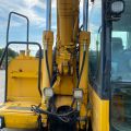 661315-9 Komatsu PW148-8 Wheeled excavator with trailer