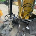 661315-23 Komatsu PW148-8 Wheeled excavator with trailer