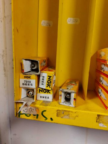 703552-6 Spark plug shelf NGK with contents