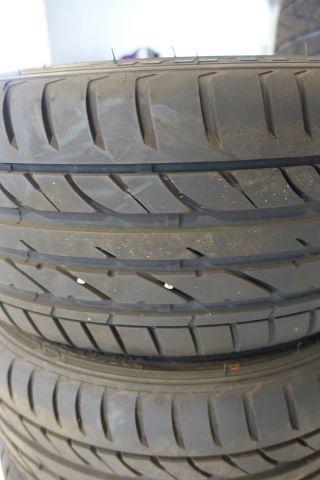 709856-3 4 tires on rim 215 / 40R17