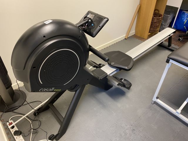 661859-1 Rowing machine Casall R600 and floor fan