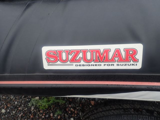 618398-10 Gummibåt SUZUMAR med tillhörande båtvagn