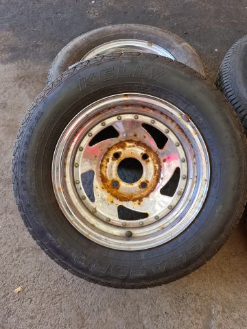 722042-3 Ford Mustang rims + 4 Kelly tires M + S P215 / 70 R14