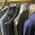 661477-29 Entire women's and men's clothing store, large batch of designer clothes and shop fittings.