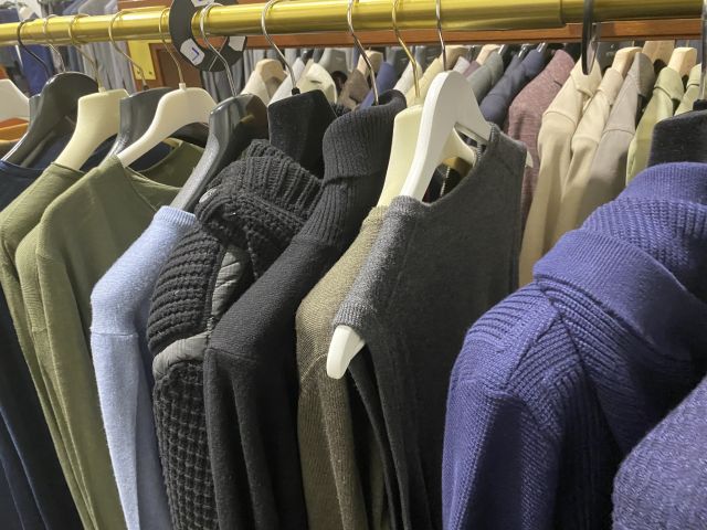 661477-29 Entire women's and men's clothing store, large batch of designer clothes and shop fittings.