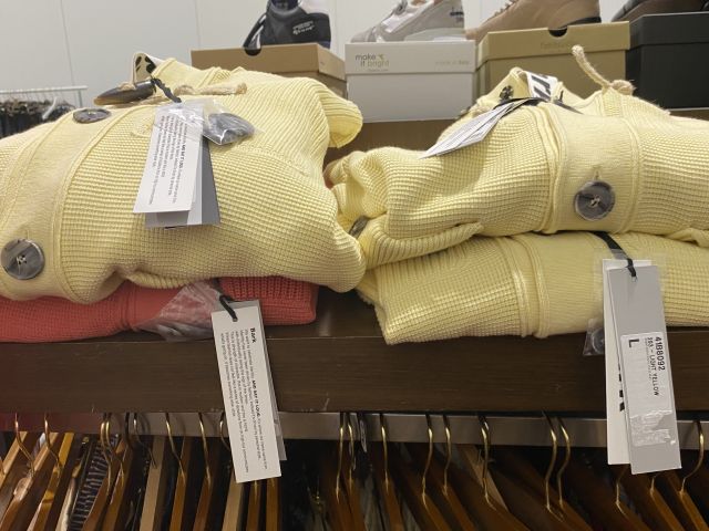 661477-115 Entire women's and men's clothing store, large batch of designer clothes and shop fittings.