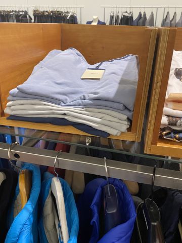 661477-120 Entire women's and men's clothing store, large batch of designer clothes and shop fittings.