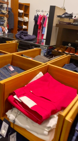 661477-136 Entire women's and men's clothing store, large batch of designer clothes and shop fittings.