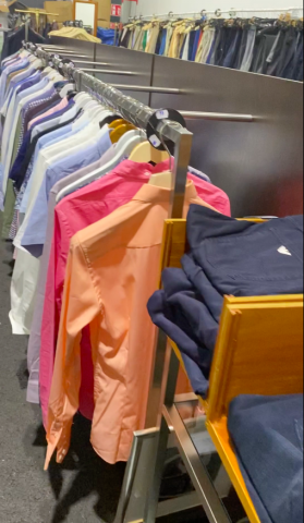 661477-139 Entire women's and men's clothing store, large batch of designer clothes and shop fittings.