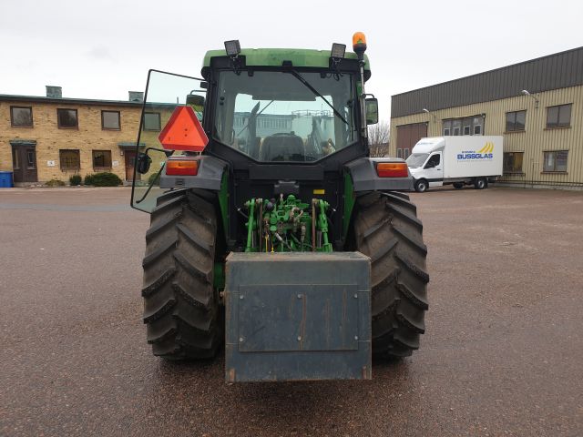 732154-5 John Deere 6110 SE 4WD 2002 with equipment (STG391)