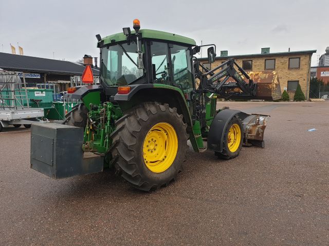732154-6 John Deere 6110 SE 4WD 2002 with equipment (STG391)