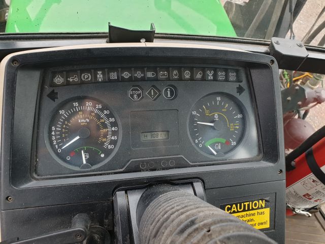 732154-34 John Deere 6110 SE 4WD 2002 with equipment (STG391)