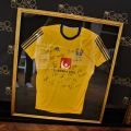 665264-1 Signed, framed match shirt from the women's national handball team